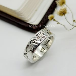 Sterling silver flower personality ring